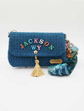 A Floral Dream: Crocheted Blue Handbag with Personalized Touch