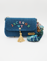 A Floral Dream: Crocheted Blue Handbag with Personalized Touch