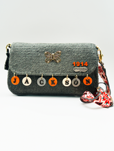 Fluttering with Charm: Crocheted Handbag with Delicate Butterfly