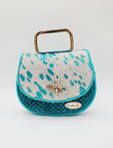 Elegant Handcrafted Handbag with a Unique Accessory for Any Occasions