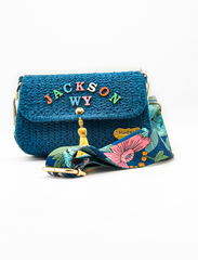 A Floral Dream: Crocheted Blue Handbag with Personalized Touch