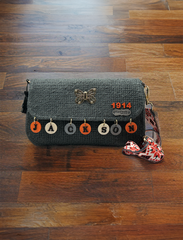 Fluttering with Charm: Crocheted Handbag with Delicate Butterfly
